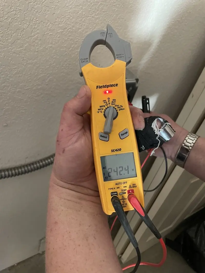 Voltage testing with clamp meter during Aluminum Wiring Replacement in Columbia